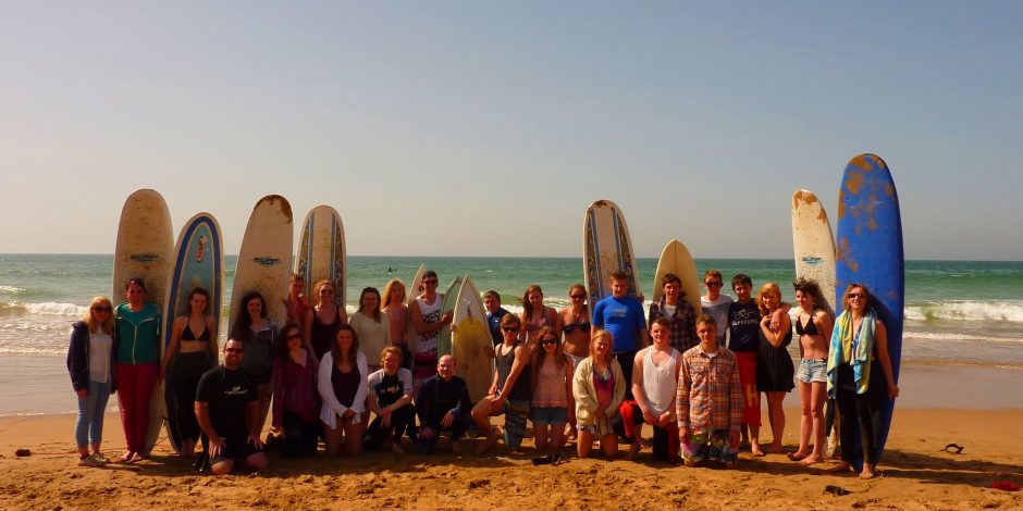 surfers in moroccan beach