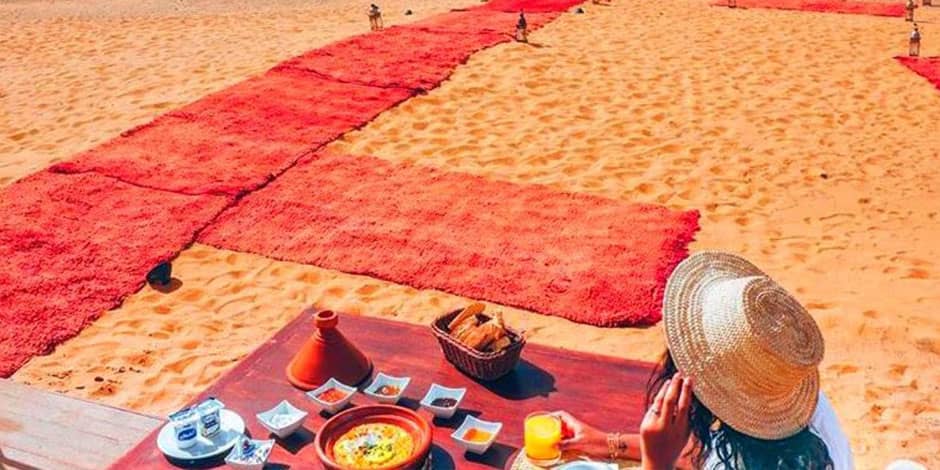 woman having breakfast in the desert